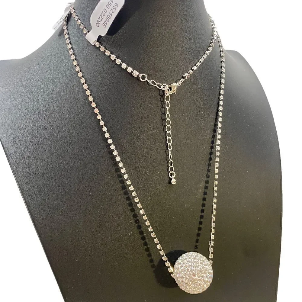 Glittery Rhinestone Ball on Long Rhinestone Chain.